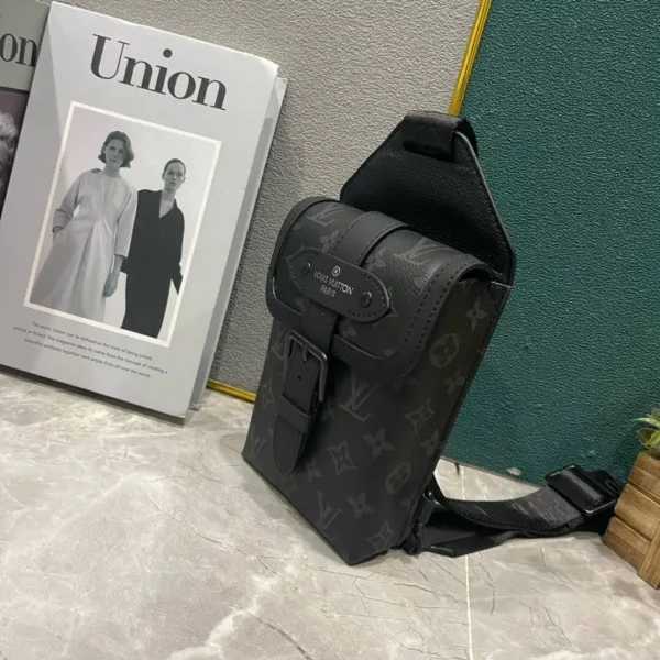 WhatsApp-Image-2026-08-24-at-10.16.01.webp Louis Vuitton Monogram Eclipse Saumur Slingbag 26cm/10.25in Black M45912