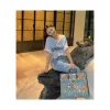 disney-x-gucci-donald-duck-tote-bag-15-ecbf5ff8adf8.webp Disney x Gucci Donald Duck Tote Bag