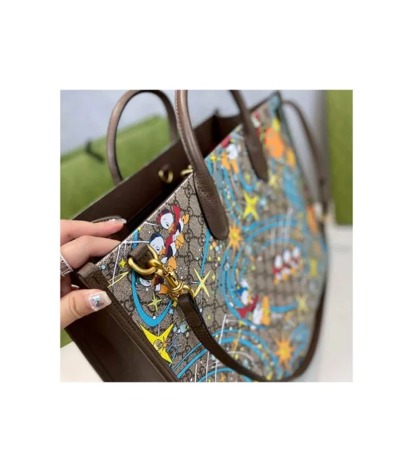 disney-x-gucci-donald-duck-tote-bag-27-9d2cb8a88f50.webp Disney x Gucci Donald Duck Tote Bag