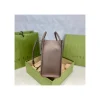 disney-x-gucci-donald-duck-tote-bag-3-9e8f44bbebcb.webp Gucci Beige GG Supreme Canvas Donald Duck Tote Bag 31cm