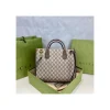 disney-x-gucci-donald-duck-tote-bag-4-fd2033bbe488.webp Gucci Beige GG Supreme Canvas Donald Duck Tote Bag 31cm
