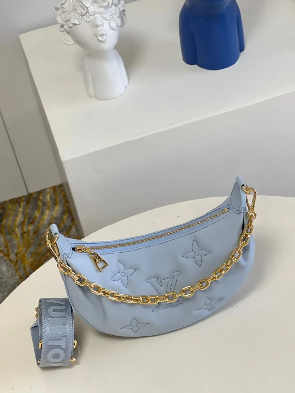 e48026ea-ddfc217711d1.webp Louis Vuitton Over The Moon 27Cm Blue, Designer Handbags, Womens Purse, luxury bags