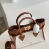 f8d98db8-9a92844474f9.webp Louis Vuitton On My Side Pm 25Cm Brown, Designer Handbags, Womens Purse, luxury bags