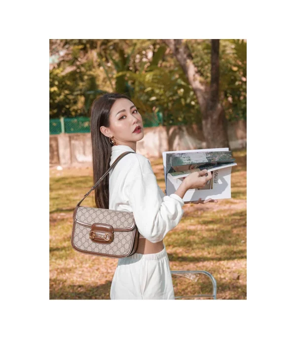 gucci-1955-horsebit-brown-gg-supreme-canvas-shoulder-bag-3-69731627e39e.webp Gucci 1955 Horsebit Brown GG Supreme Canvas Shoulder Bag 25cm
