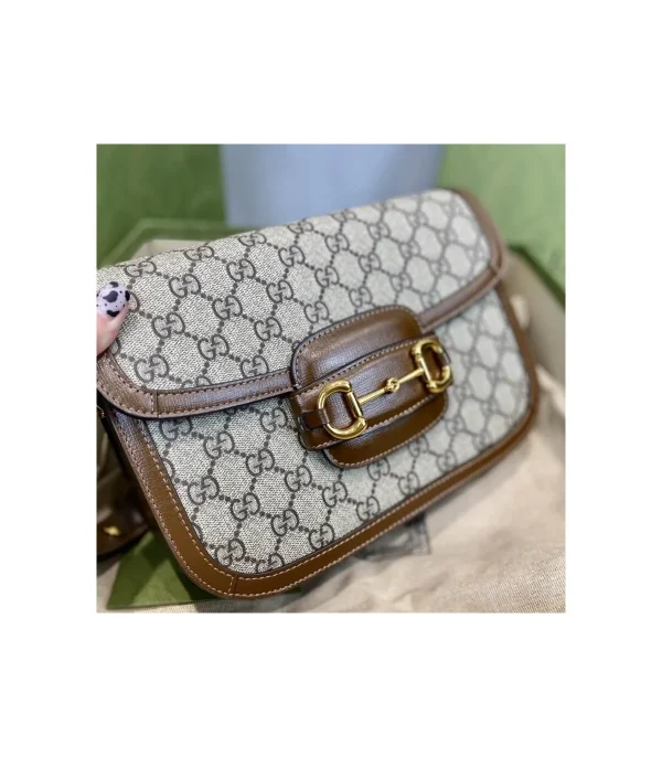 gucci-1955-horsebit-brown-gg-supreme-canvas-shoulder-bag-9-a72d3e777505.webp Gucci 1955 Horsebit Brown GG Supreme Canvas Shoulder Bag 25cm