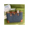 gucci-denim-ophidia-gg-medium-tote-2-acd12d7be8d0.webp Gucci Indigo & Brown Ophidia Denim Tote 38cm
