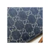 gucci-denim-ophidia-gg-mini-bag-7-cff1f8bae4cb.webp Gucci Mini Ophidia Bag in Eco Washed GG Jacquard Denim 17.5cm