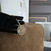 image-2026-08-14T141635.912-0cfaaf8ed0cd.webp Chanel Maxi Bowling Bag Calfskin Suede, Calfskin Leather & Gold-tone Metal Dark Beige 42cm/16.5in AS6212