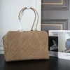 image-2026-08-14T141640.581-cff2861a4305.webp Chanel Maxi Bowling Bag Calfskin Suede, Calfskin Leather & Gold-tone Metal Dark Beige 42cm/16.5in AS6212