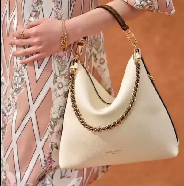 image-69-cb00b90128bb.webp Louis Vuitton Multipass Bag Vanilla 30cm M29094