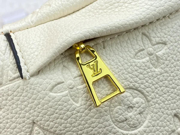 jSskIO5-e8725ec48977.webp Louis Vuitton Monogram Empreinte Creme Bumbag 37cm/14.6in M44836, Designer Handbags, Womens Purse, luxury bags