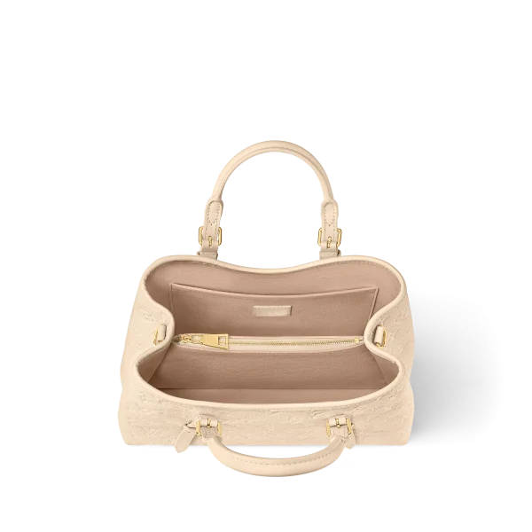 jpg-cb0e51d7ae70.webp Babylone Tote PM
