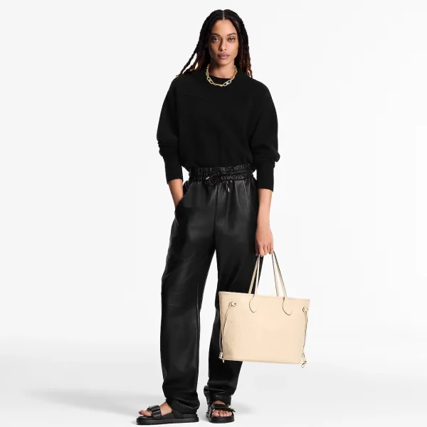 louis-vuitton-neverfull-mm-M46676_PM1_Worn_20view-6c17f028c2fe.webp Louis Vuitton Neverfull Mm Tote Bag Crme Beige 31cm M46676, Designer Handbags, Womens Purse, luxury bags