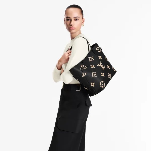 louis-vuitton-neverfull-mm-M58907_PM1_Cropped_20worn_20view-18ea2f189856.webp Louis Vuitton Neverfull MM Tote Bag Monogram Empreinte Black 31cm M58907, Designer Handbags, Womens Purse, luxury bags