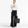 louis-vuitton-neverfull-mm-M58907_PM1_Worn_20view-db6c0d7acfd5.webp Louis Vuitton Neverfull MM Tote Bag Monogram Empreinte Black 31cm M58907, Designer Handbags, Womens Purse, luxury bags