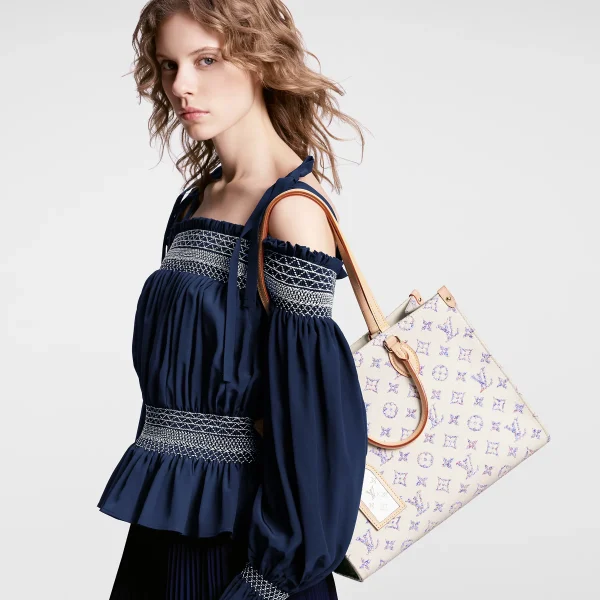 louis-vuitton-onthego-mm-M24708_PM1_Worn-view-7fa590788c68.webp OnTheGo MM
