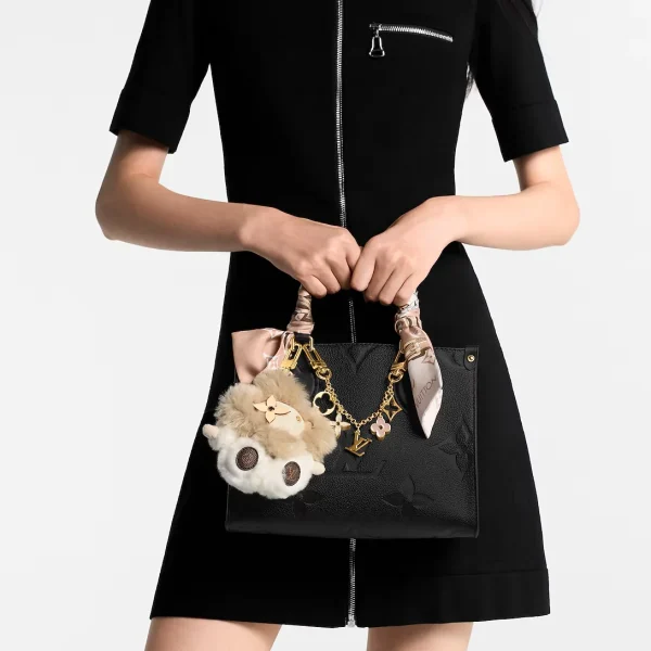 louis-vuitton-onthego-pm-M45653_PM1_Worn_20view-2c1c1a3612a4.webp Louis Vuitton Onthego PM Monogram Empreinte Handbag Black 25cm M45653, Designer Handbags, Womens Purse, luxury bags