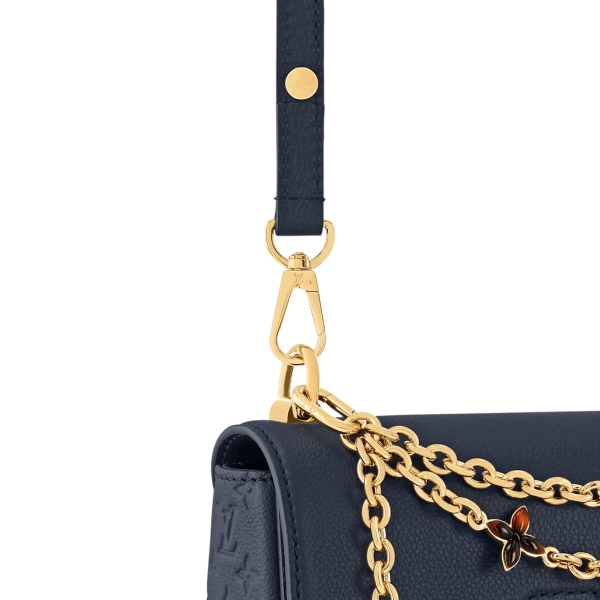 louis-vuitton-twist-mm-slim-M14342_PM1_Closeup_20view-9c2f8cbddec1.webp Louis Vuitton Twist MM Slim Medium Navy Taurillon Leather Shoulder Bag 23cm/9.1in M14342, Designer Handbags, Womens Purse, luxury bags