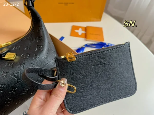 lvb75-1-8c683ddbfcd9.webp Louis Vuitton Sac Sport Bag Monogram Empreinte Black 26Cm M46610, Designer Handbags, Womens Purse, luxury bags
