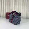 photo_6258002895324696850_y-24edb03a014c.webp Gucci Giglio GG Denim Tote Bag 25cm/9.8in